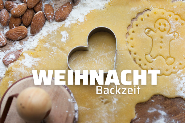 KI generiert: Das Bild zeigt eine bunte, frische Salatschüssel mit verschiedenen Gemüsesorten auf einem grünen Hintergrund. Auf der linken Seite befindet sich der Schriftzug "Veganuary".